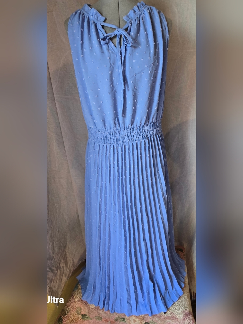 Sleeveless Blue Midi Dress with Tie Neck and Pleated Skirt